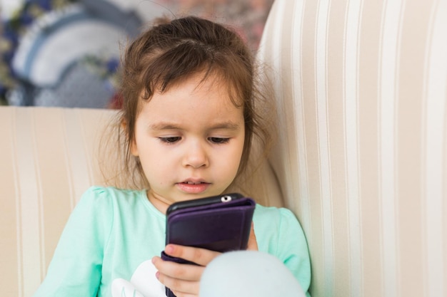 Cute girl using mobile phone