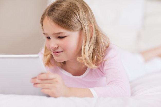 Cute girl using a tablet computer