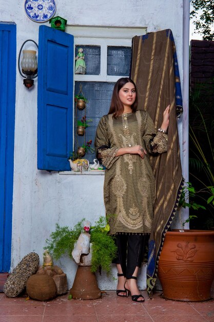 Cute Girl Wearing Designer Kurta Pajama at a Beautiful Location Standing with Plants for Photoshoot