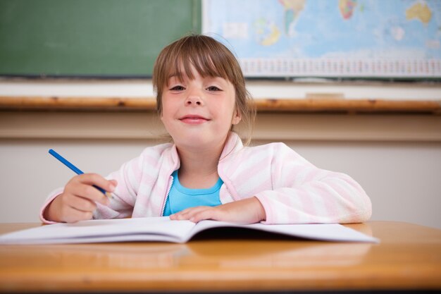 Cute girl writing