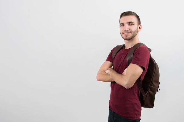 Photo cute guy standing sideways with copy space