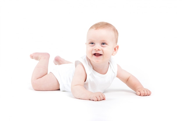 Cute happy little boy in white shirt 