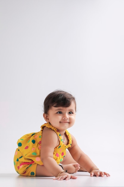 Cute indian baby girl smiling and giving expression