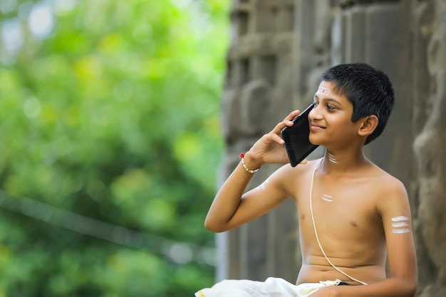 Cute indian child with tablet