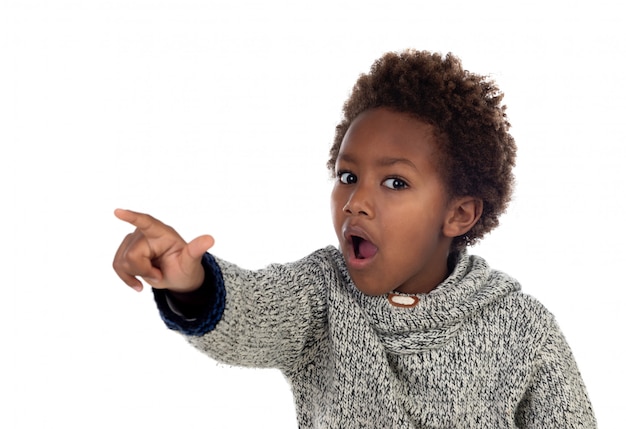 Cute kid pointing with his finger at camera