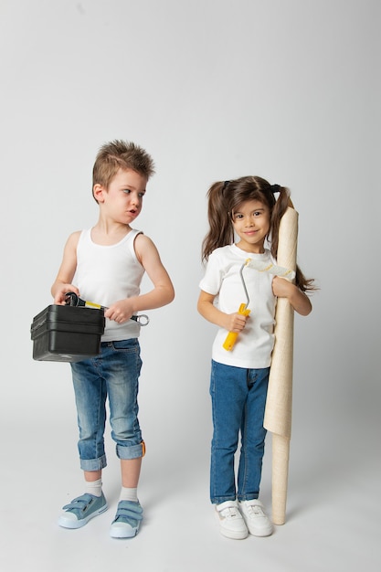 Cute kids and building tools