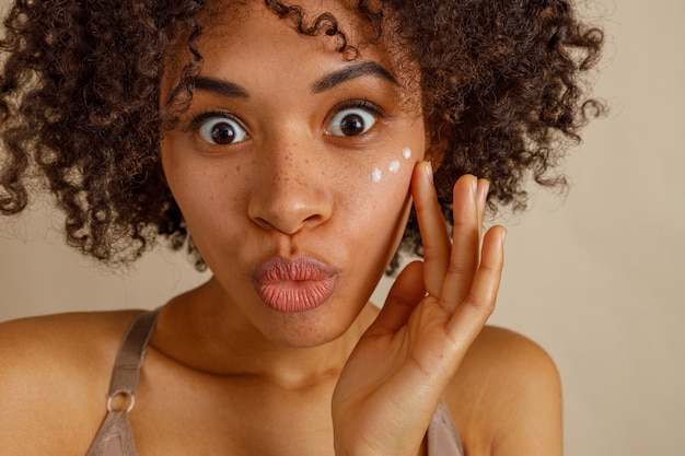 Photo cute lady getting skin antiaging treatment indoors