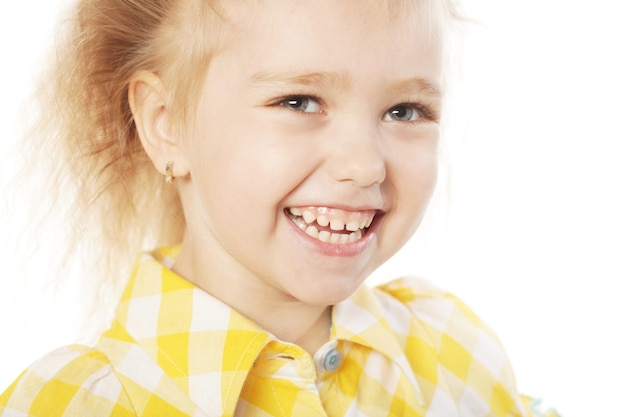 Cute laughing girl over white