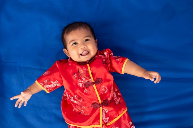 Cute little asian baby boy in Chinese dress