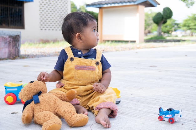 Cute little baby boy play at the park