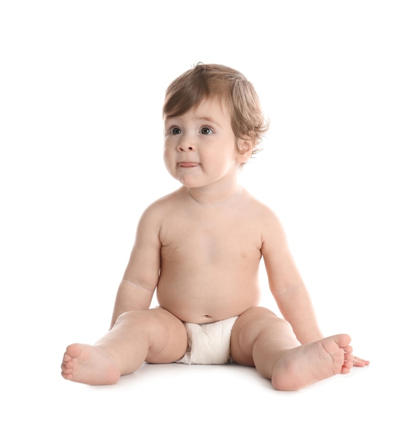 Cute little baby in diaper on white background