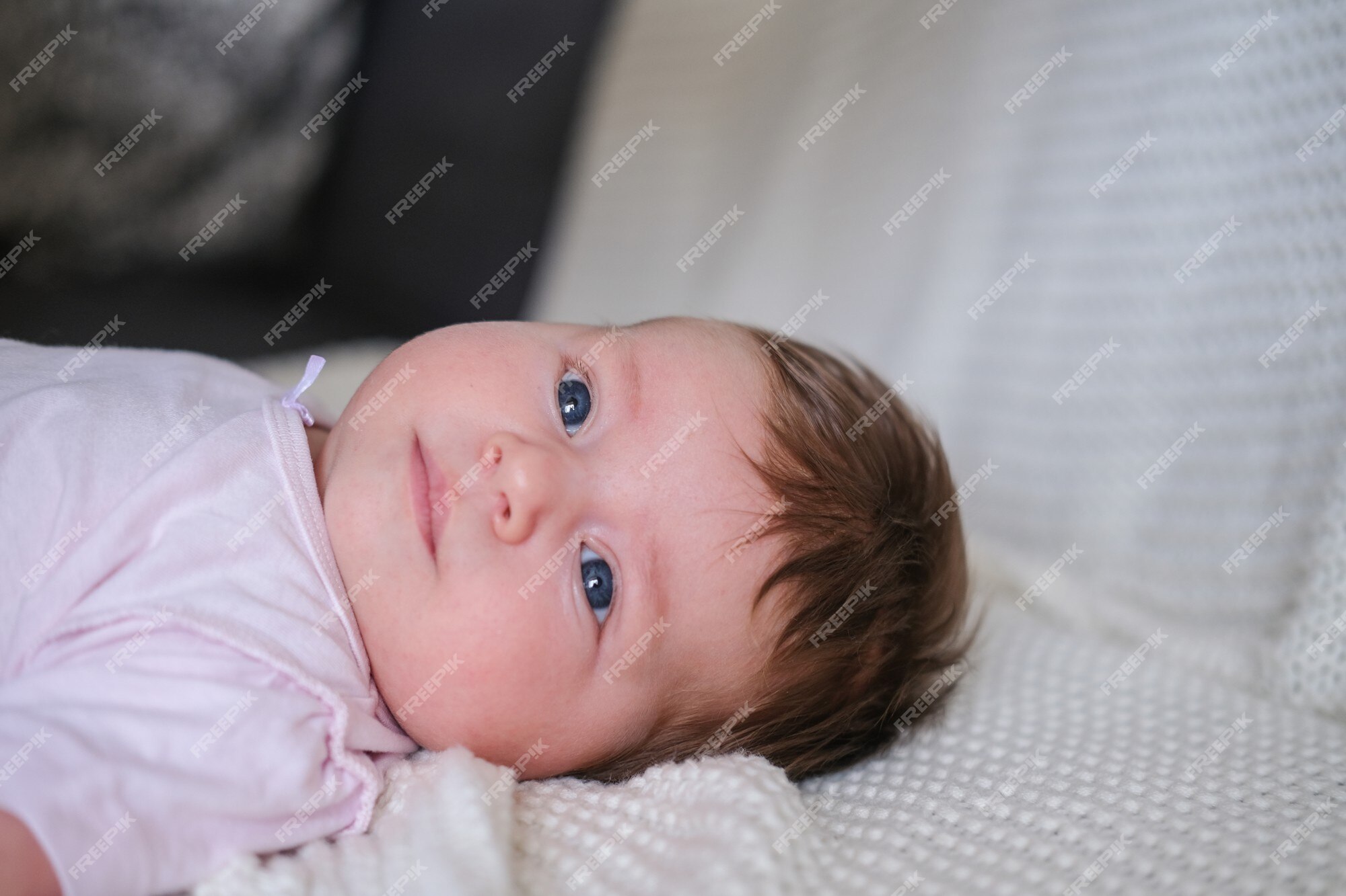 Premium Photo | Cute little baby girl with dark hair lying on white plaid. childcare and maternity concept. newlife. happy family. at home. love. sweet. tenderness. Premium Photo | Cute little baby girl with dark hair lying on white plaid. childcare and maternity concept. newlife. happy family. at home. love. sweet. tenderness.