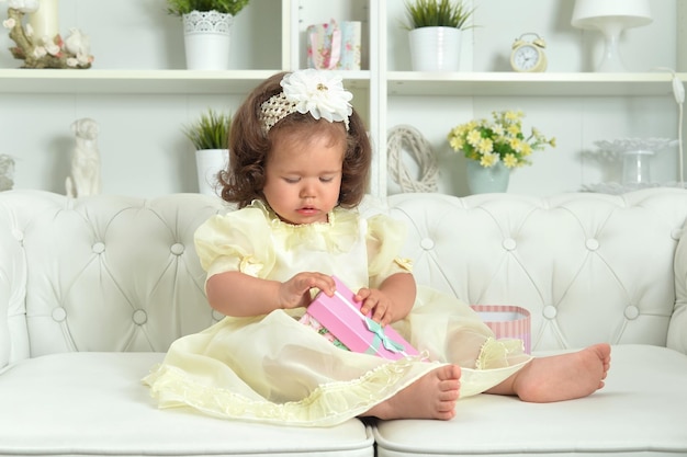 cute little baby girl with gift box