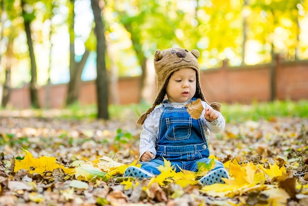 cute little baby, sitting in the park