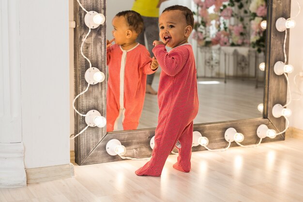 Cute little boy at home. Mixed race child.