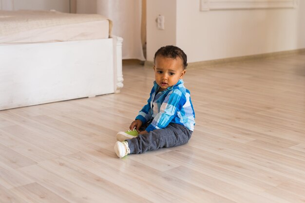 Cute little boy at home. Mixed race child