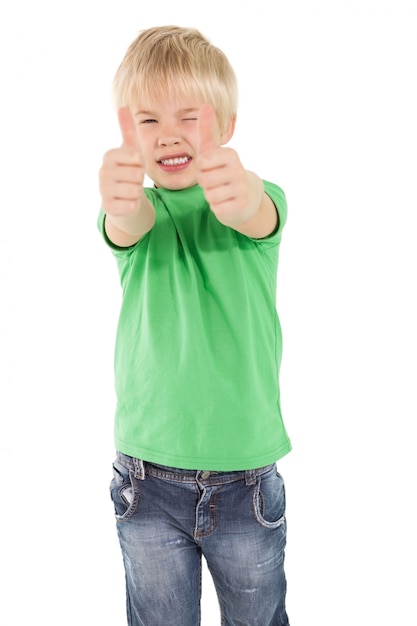 Cute little boy showing thumbs up