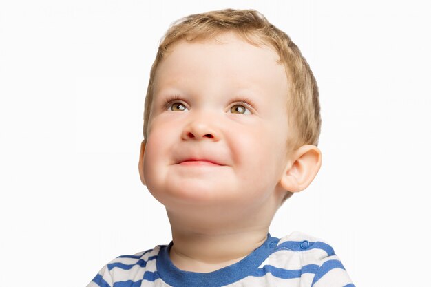 Photo cute little boy smiling, close-up, isolated