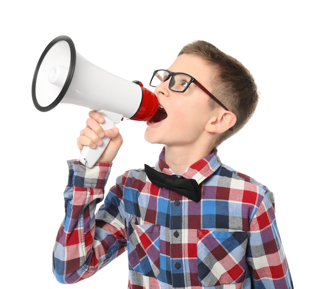 Cute little boy with megaphone on white 