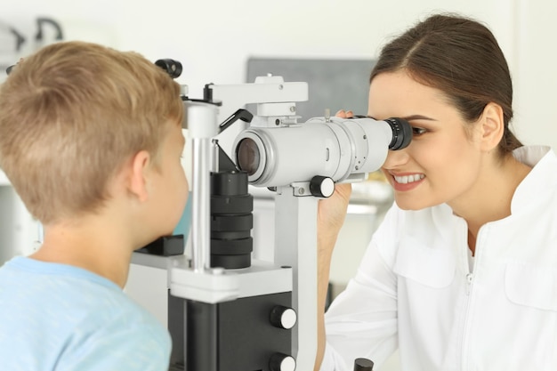 Cute little child at ophthalmologist's office