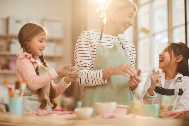 Cute Little Children in Pottery Studio