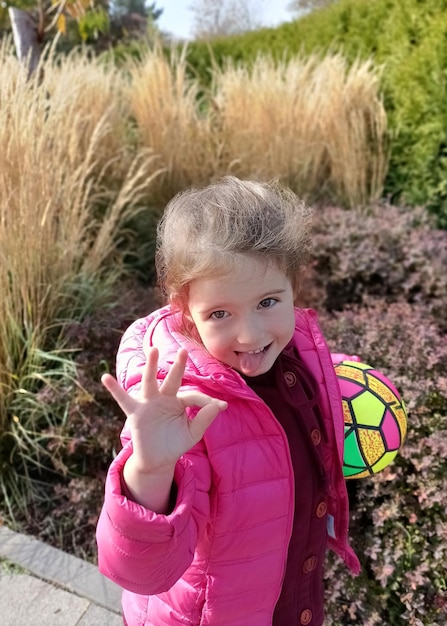 Cute Little expressive girl makes funny faces