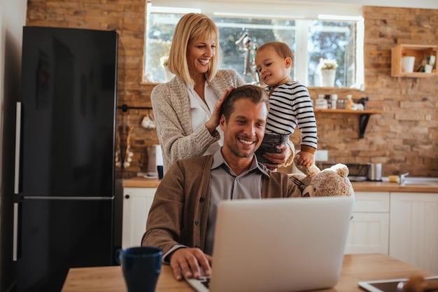 Photo cute little family having fun in the kitchen