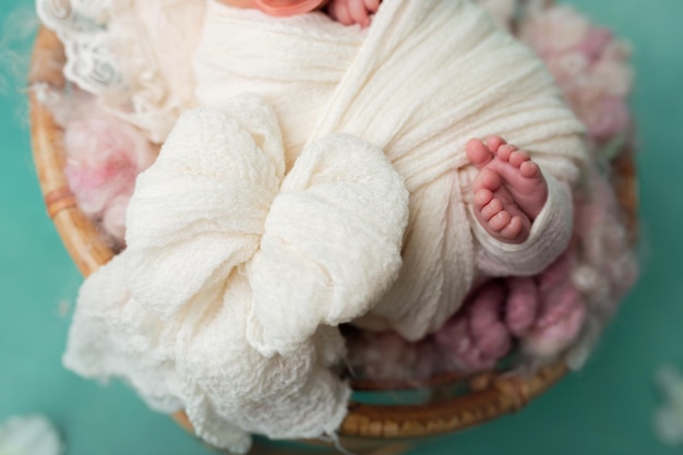 Cute little feets of newborn baby