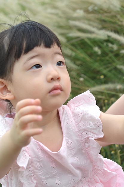 Cute little girl asks to carry her