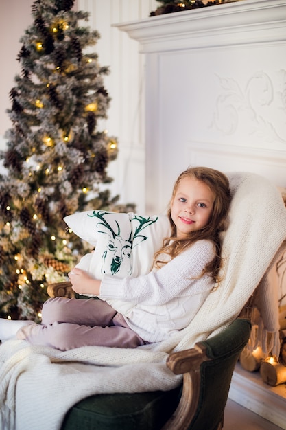 Cute little girl on Christmas at home