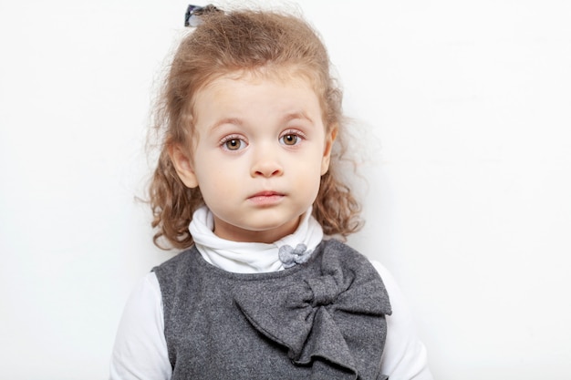 Cute little girl, close-up, light 