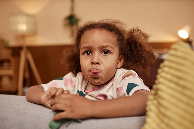 Cute little girl grimacing