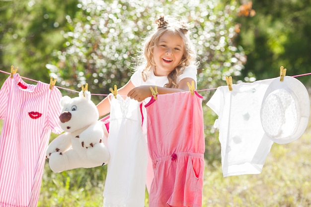 Cute little girl laundring