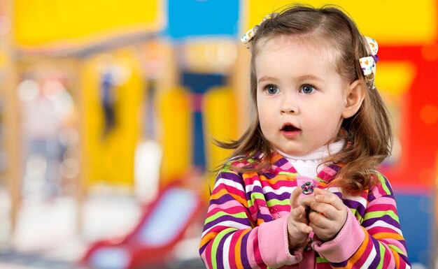 Cute little girl portrait on background