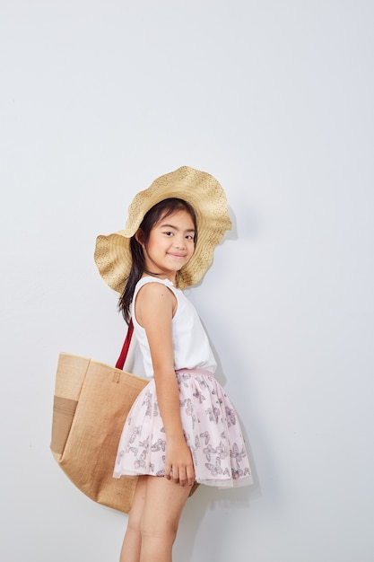 Cute little girl on shopping summer