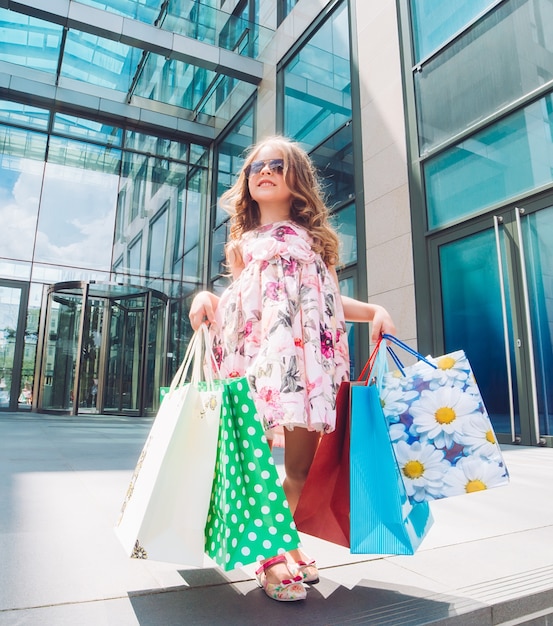 Cute little girl on shopping.