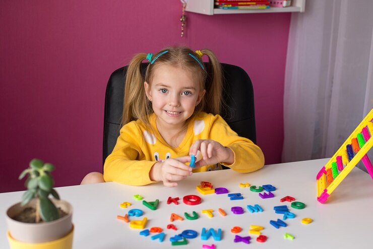 Cute little girl smiling English for children with autism