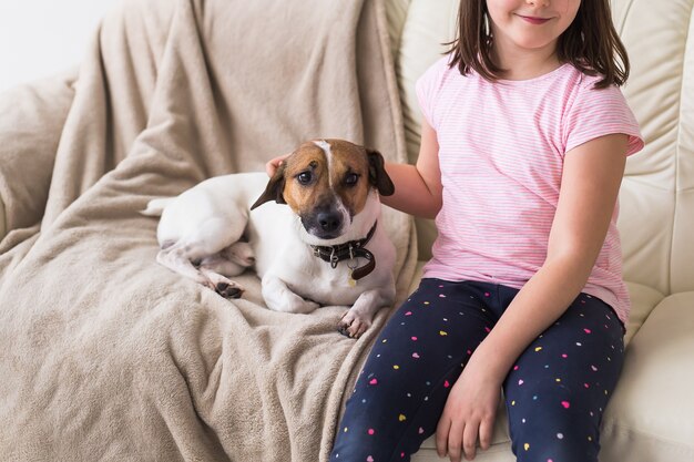 Cute little girl with an adorable dog