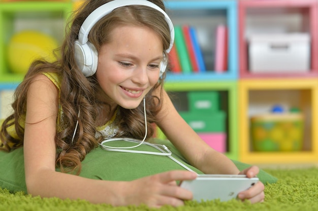 Cute little girl with headphones