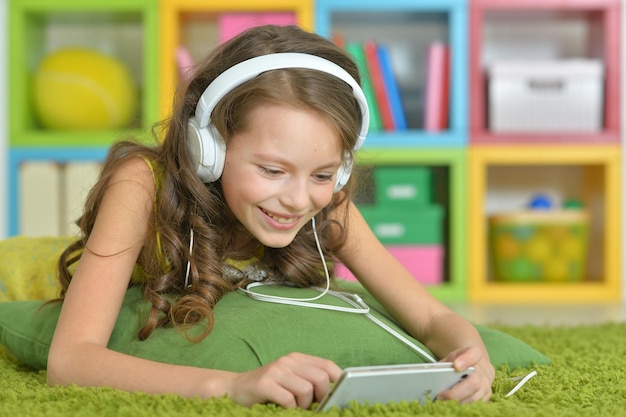 Cute little girl with headphones