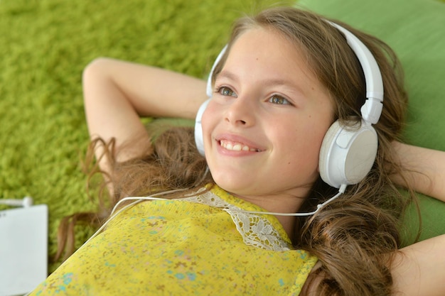 Cute little girl with headphones