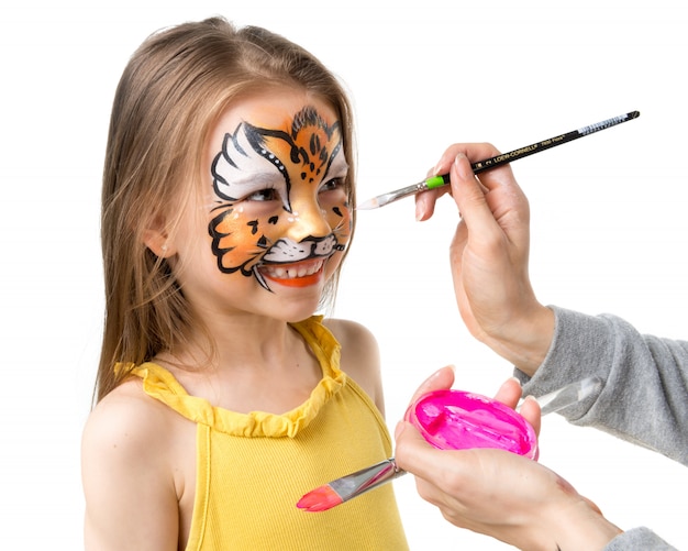 Cute little girl with painted face