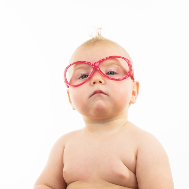 Cute little girl with pink glasses