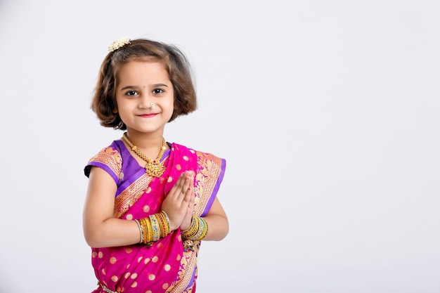 Cute little indian/asian girl in praying pose