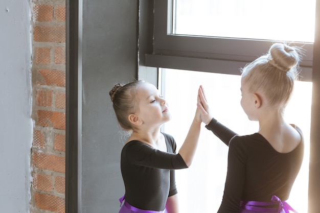 Cute little kids dancers on dance studio