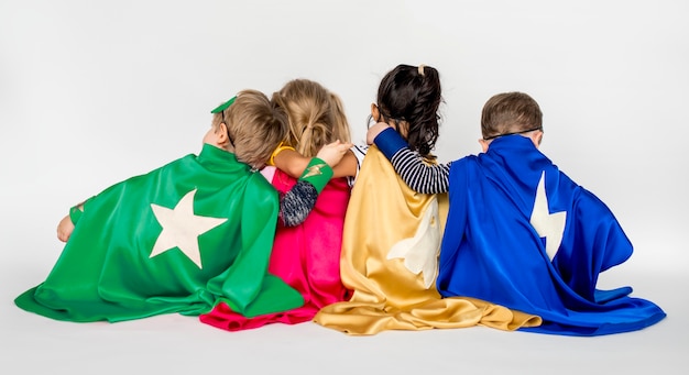 Cute little kids playing superheroes