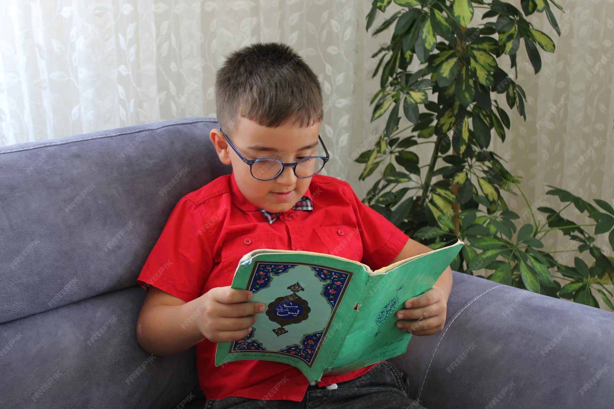 premium-photo-cute-little-muslim-boy-reading-holy-quran
