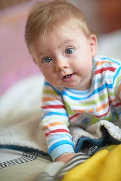 cute  little newborn baby smilling  at home