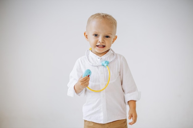 Cute littlr boy doctor with stethoscope