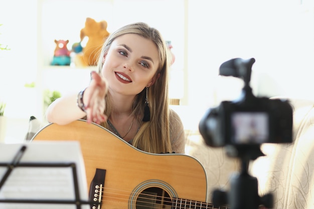 Cute musician filming musical clip